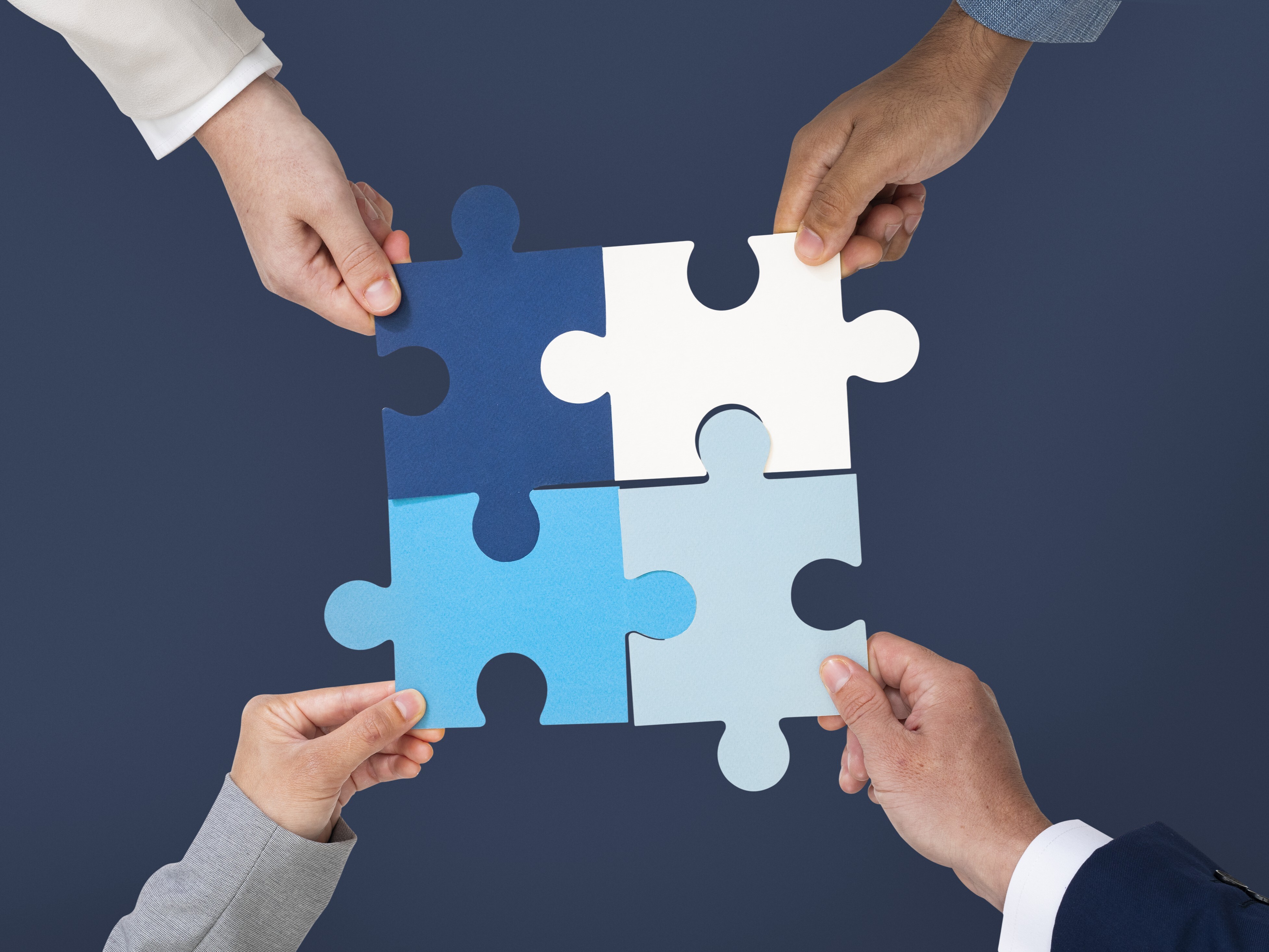 hands-holding-puzzle-business-problem-solving-concept-1 hands-holding-puzzle-business-problem-solving-concept-1